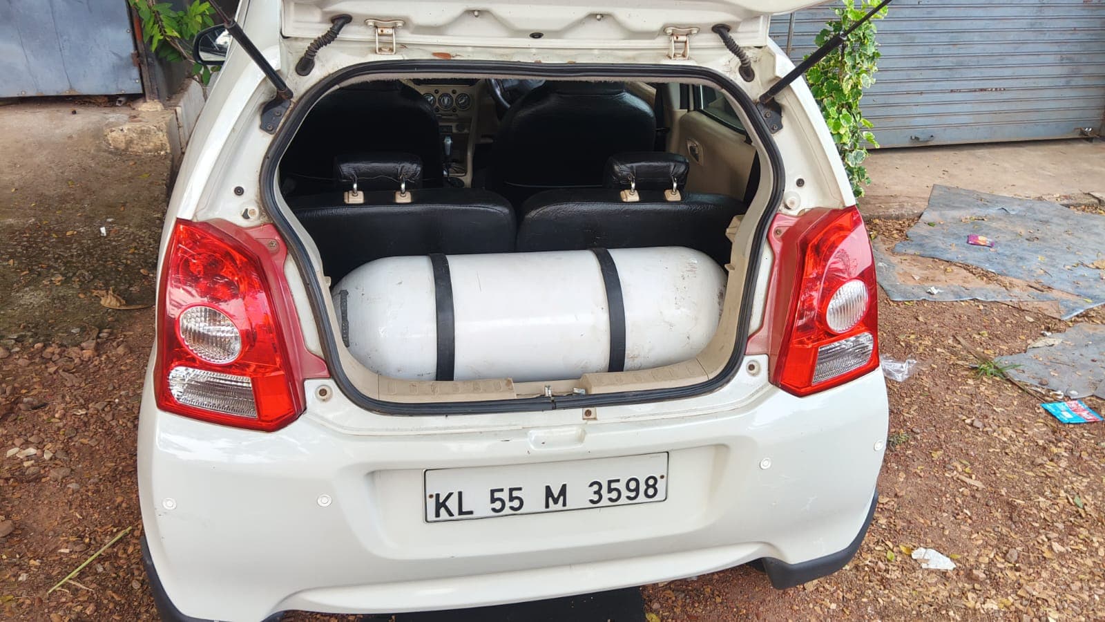 CNG cylinder strapped across the boot of a hatchback